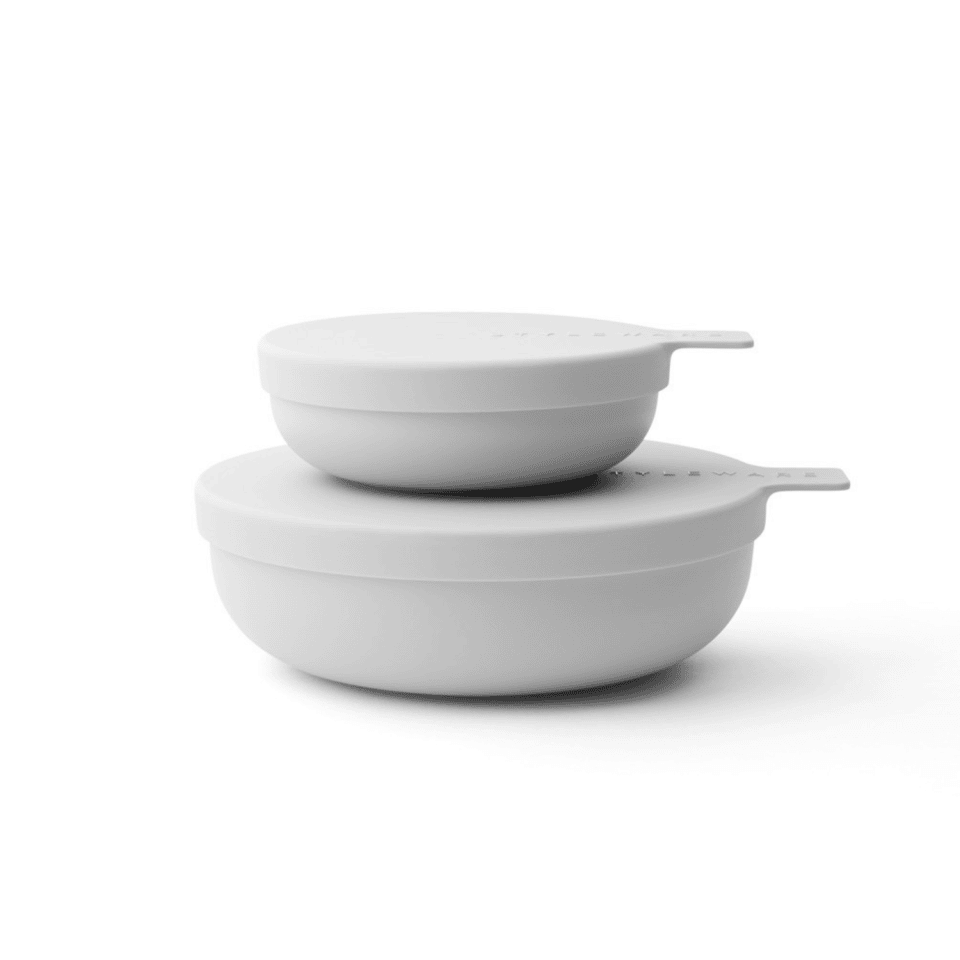 Stylish salad bowls with lids in grey, designed for food serving and storage.