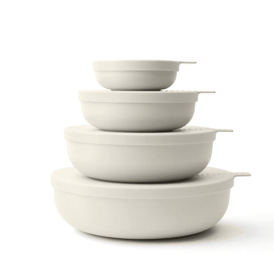 Serving bowls with lids in a modern aesthetic.