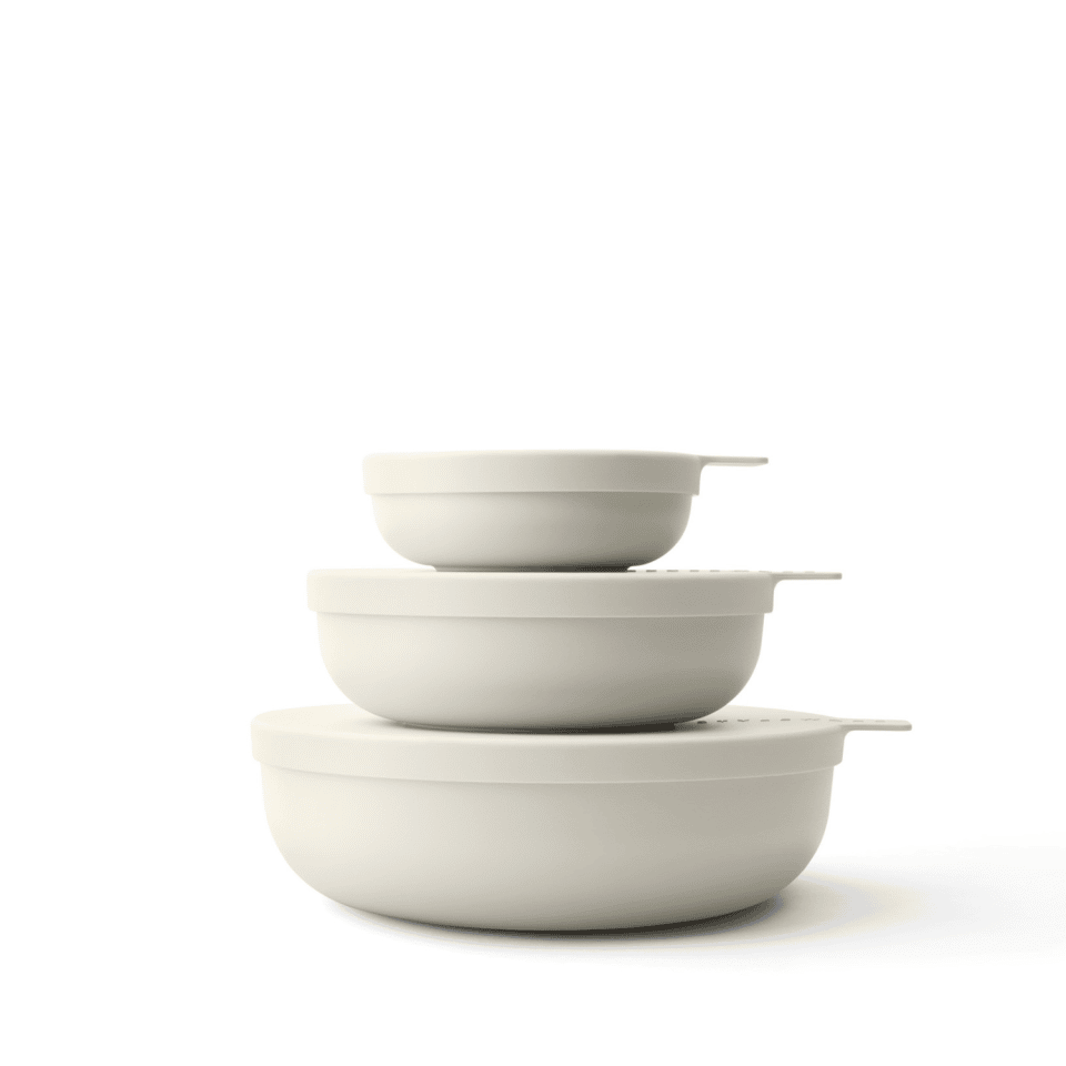 Serving bowls with lids in a modern aesthetic.