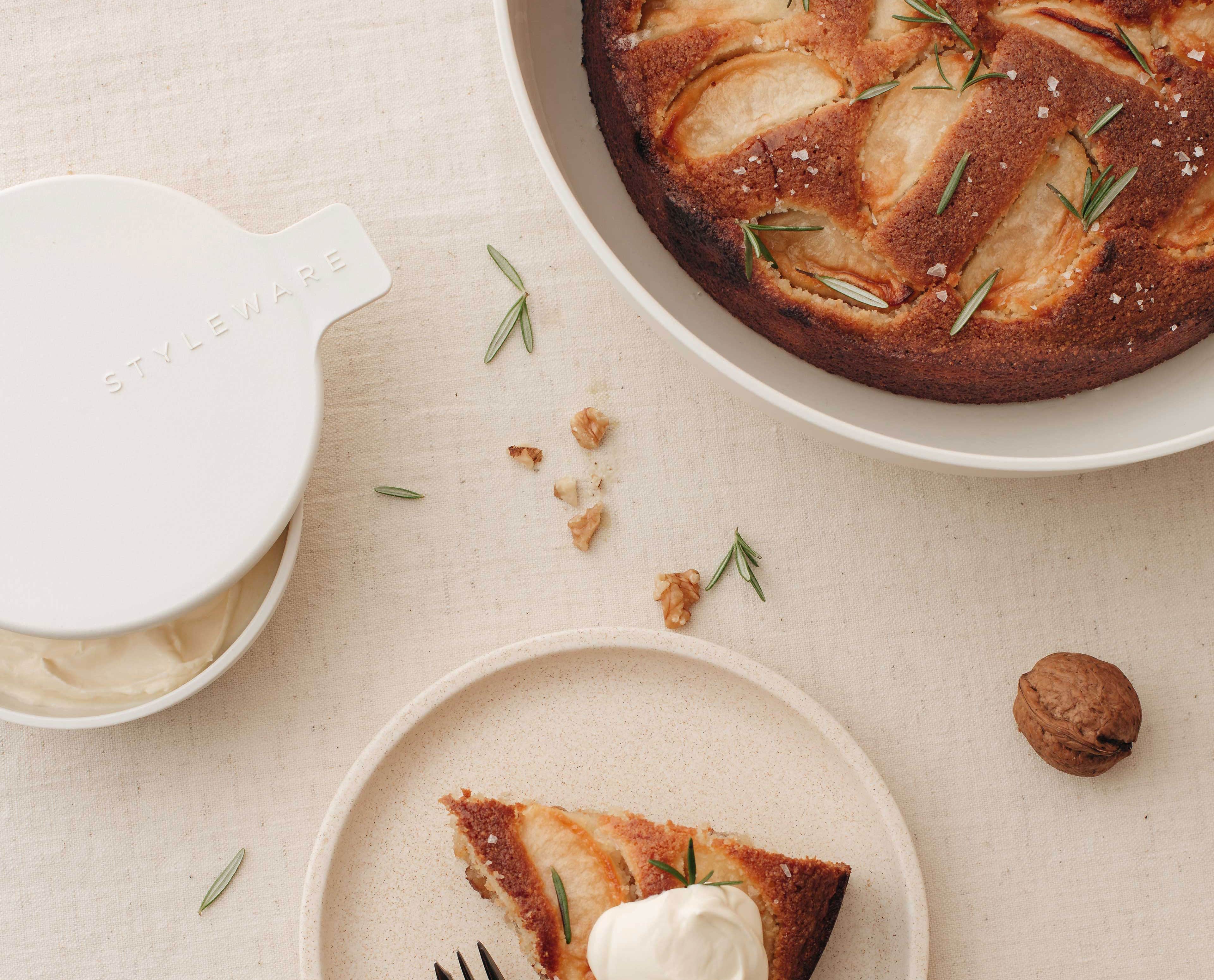 Easy apple, walnut and olive oil cake recipe. Perfect with a dollop of cream, served and stored in Nesting Bowls by Styleware.
