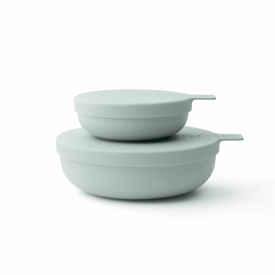 Stacking bowls in a muted eucalyptus green.